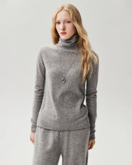 Pull ample en 100 % cachemire à col roulé et bords roulottés
