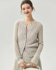 Cardigan en cachemire et soie à maille torsadée