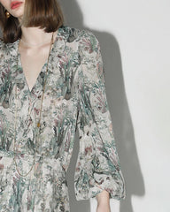 Robe longue en soie à motif floral féerique