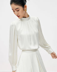 Blouse en soie plissée à col montant