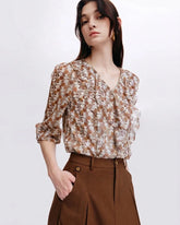 Blouse en soie à fleurs de marguerite avec volants