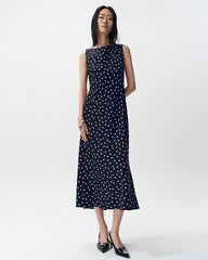 Robe midi en soie à pois coupée en biais avec dos bénitier