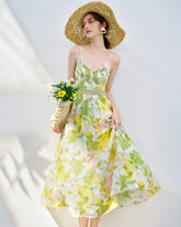 Robe midi sans manches en soie à motif floral