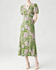 Robe midi en soie fleurie à col V et manches bouffantes