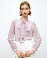 Blouse en soie à col lavallière avec manches transparentes