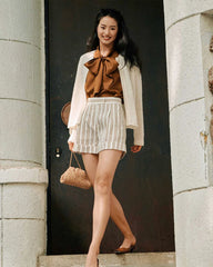 Blouse en soie sans manches à col lavallière