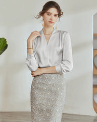 Blouse en soie plissée à col en V