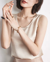 Top en Soie Sans Manches à Col Rond pour Femme Champagne