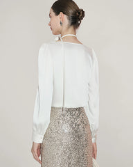 Blouse en soie élégante à col drapé