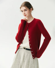 Cardigan en 100 % cachemire à maille torsadée avec boutons cœur