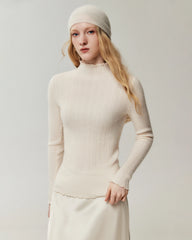 Pull en 100 % cachemire à col montant et finitions ondulées
