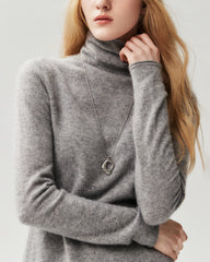Pull ample en 100 % cachemire à col roulé et bords roulottés