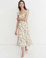 Robe en soie à fleurs et épaules à volants