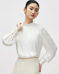 Blouse en soie plissée à col montant
