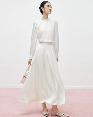 Blouse en soie plissée à col montant
