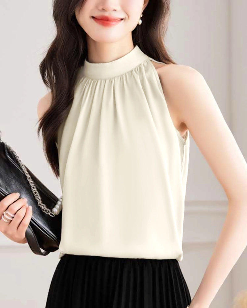 Blouse en soie sans manches à col montant