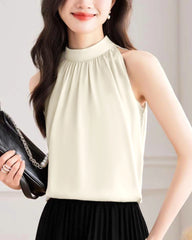 Blouse en soie sans manches à col montant