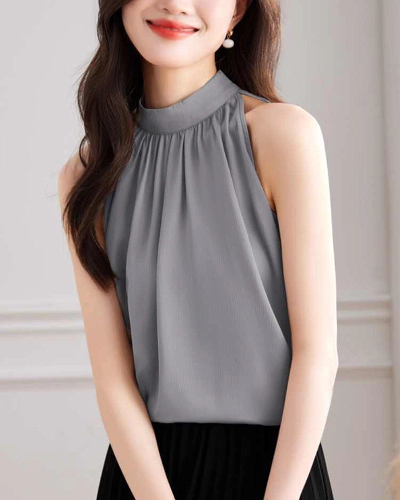 Blouse en soie sans manches à col montant