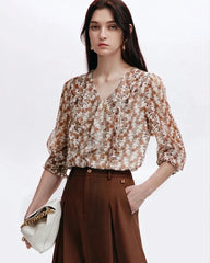 Blouse en soie à fleurs de marguerite avec volants
