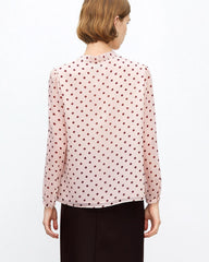Blouse en soie à pois avec lien latéral