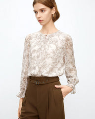 Blouse en soie à motif rose esquissée