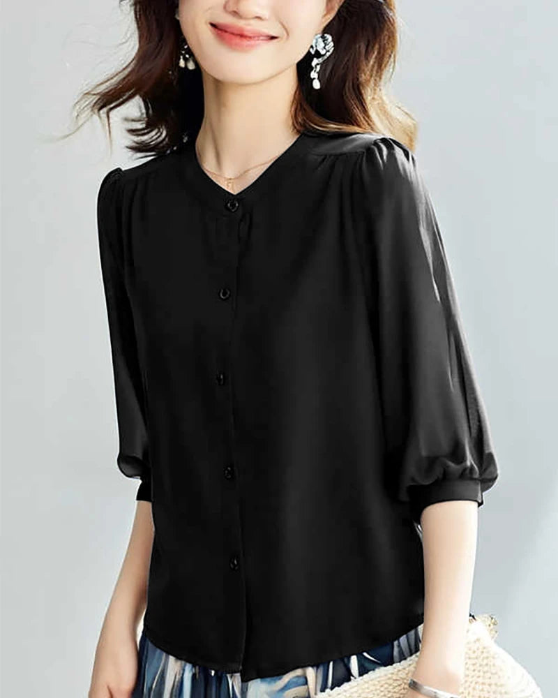 Blouse en soie à col rond et manches 3/4