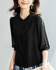 Blouse en soie à col rond et manches 3/4