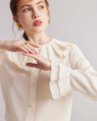 Blouse en soie à col volant et manches évasées