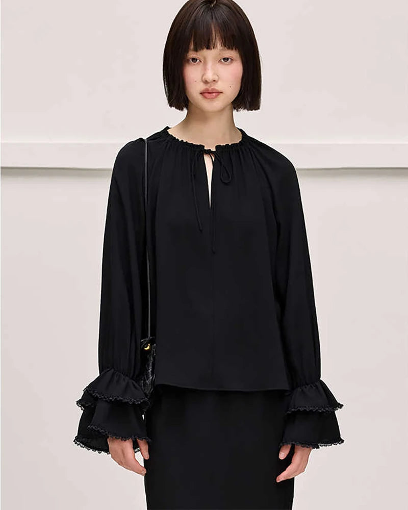 Blouse en soie à nœud et volants