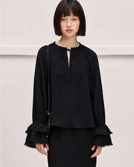 Blouse en soie à nœud et volants
