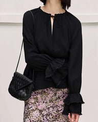 Blouse en soie à nœud et volants
