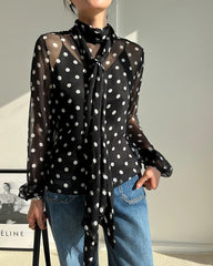 Blouse en soie transparente à pois