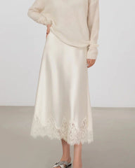 Jupe midi en soie coupe biais avec bordure en dentelle
