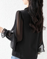 Blouse en mousseline de soie avec manches à volants