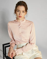 Blouse en soie avec col montant et détails volantés