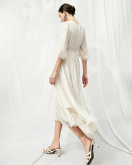 Robe midi en soie à décolleté V avec détail torsadé à la taille